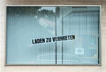 Schaufenster mit Schild "Laden zu vermieten"