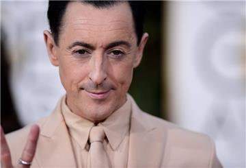 Alan Cumming arrives for the 72nd Annual Golden Globe Awards at the Beverly Hilton Hotel, in Beverly Hills.
