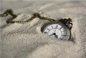 Uhr im Sand
