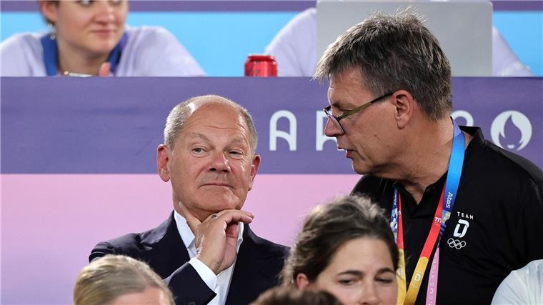 Bundeskanzler Olaf Scholz (l.) wünscht sich Olympische Spiele in Deutschland.