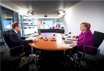 Bundeskanzlerin Angela Merkel (CDU) und der Regierende Bürgermeister von Berlin, Michael Müller (SPD), konferieren per Videoschalte mit den Ministerpräsidenten der Länder. Am 22. März findet der nächste Bund-Länder-Gipfel zu den Corona-Maßnahmen statt.