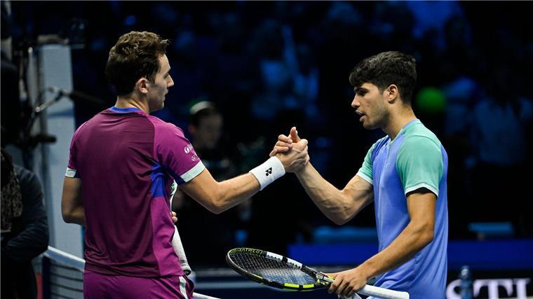 Gelingt Zverev der zweite Sieg beim Saisonfinale? Casper Ruud (l) besiegte in Turin den angeschlagenen Carlos Alcaraz.