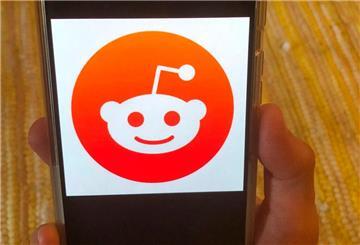 Ein Handy mit dem Symbol von Reddit