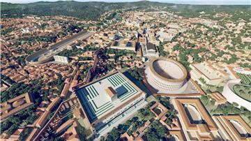 Das computergenerierte Bild zeigt eine Luftaufnahme des antiken Roms im Jahr 320 n. Chr. mit dem Kolosseum (M) als 3D-Rekonstruktion „Rome Reborn 4.0“.