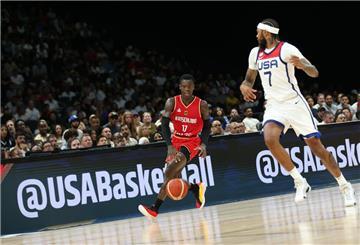 Dennis Schröder (links) gehört zu den Stars im deutschen Team. Gegen Halbfinalgegner USA muss der NBA-Profi all sein Basketball-Können aufs Parkett bringen.