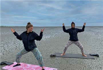 Yogakursus im Watt