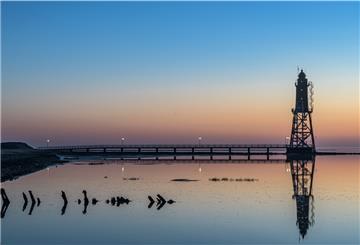 Der Leuchtturm bei Dorum - kristallklar fotografiert von Stefan Wyrwa, einem der Bewerber für feelBREMERHAVEN.