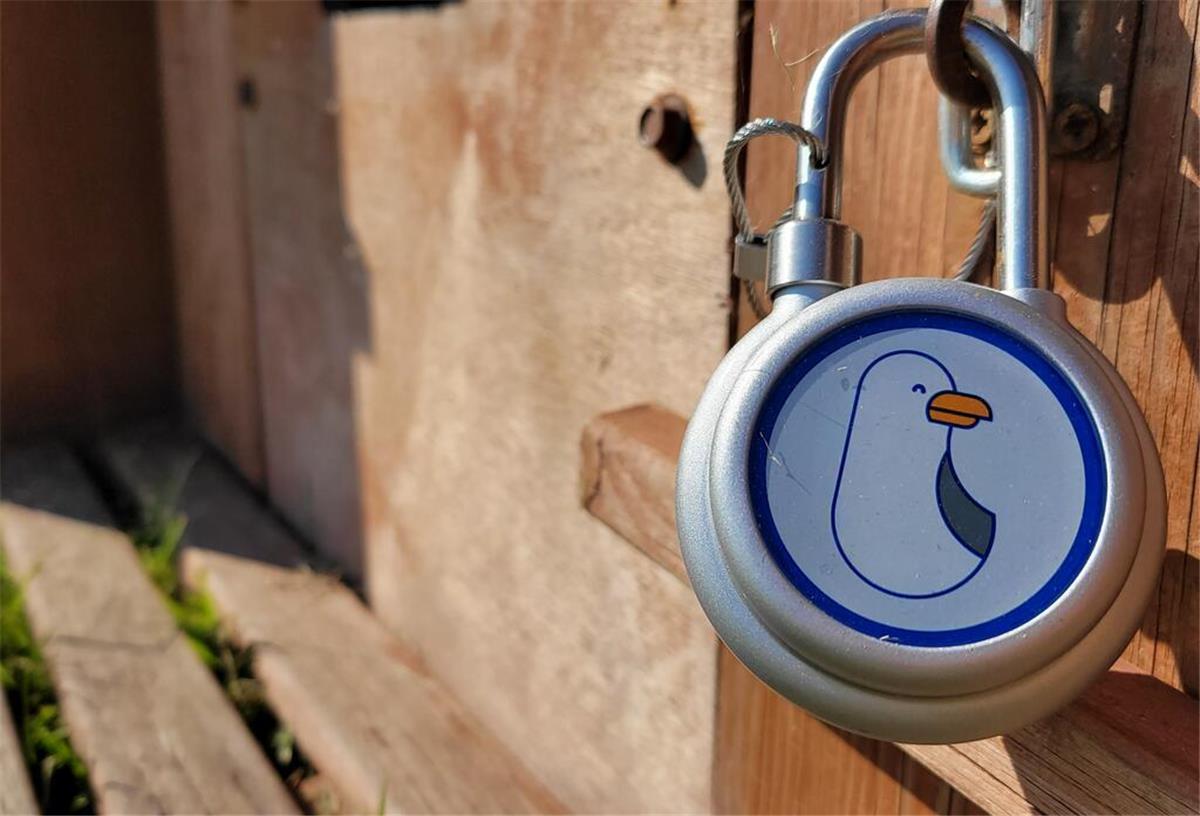 Digitales Schloss am Strandkorb mit Möwenmotiv