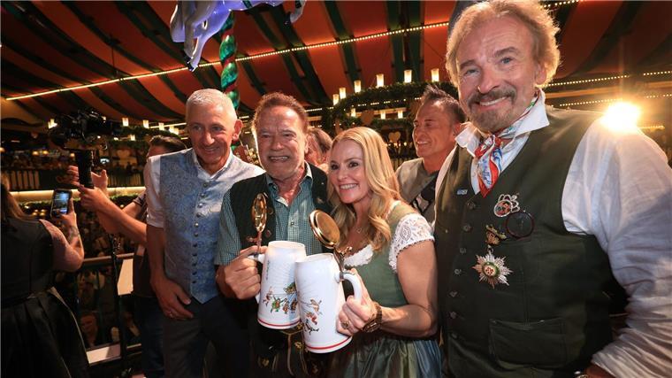 Die bekannte Riege der Wiesn-Promis - mit Schwarzenegger und Gottschalk.