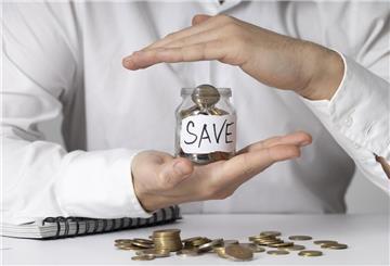 Glas mit gesparten Geld gesichert.