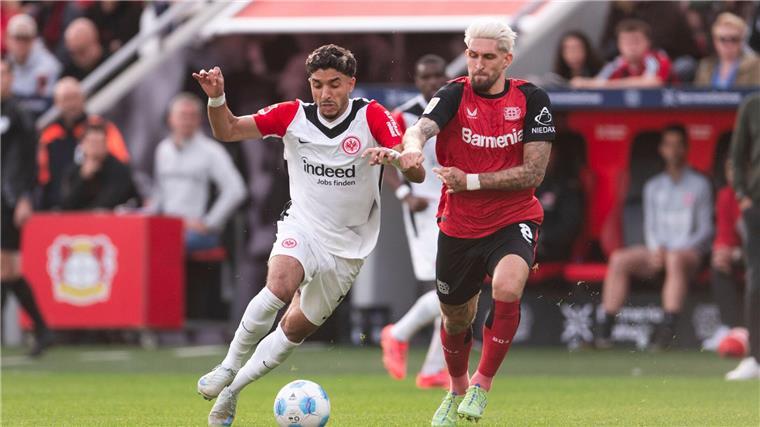 Boniface rettet Bayer 2:1-Sieg im Top-Duell mit Frankfurt Die Torschützen Andrich (l) und Marmoush im Duell