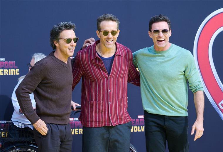 Drei Freunde: Shawn Levy (l-r), Ryan Reynolds und Hugh Jackman 