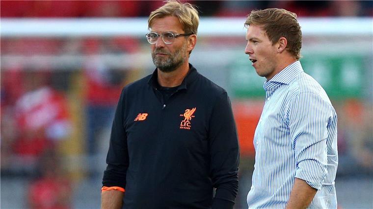 Einst Vereinstrainer, jetzt nicht mehr: Jürgen Klopp und Julian Nagelsmann (r).