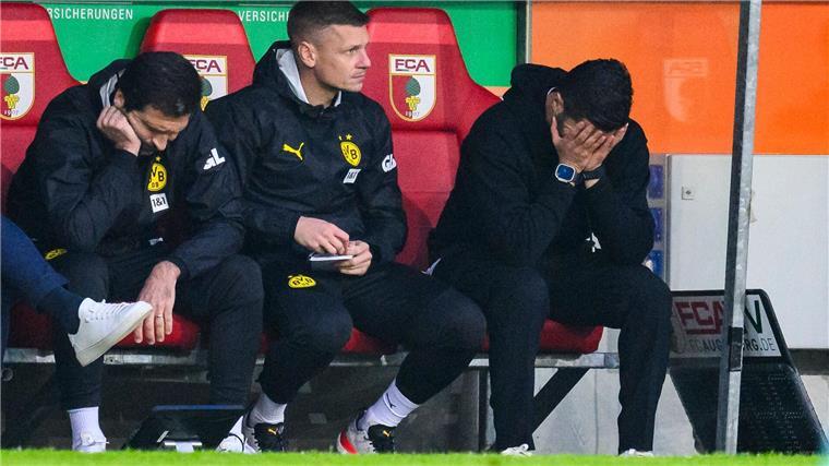 Enttäuschung pur: BVB-Trainer Nuri Sahin (r.) während des Spiels auf der Bank.