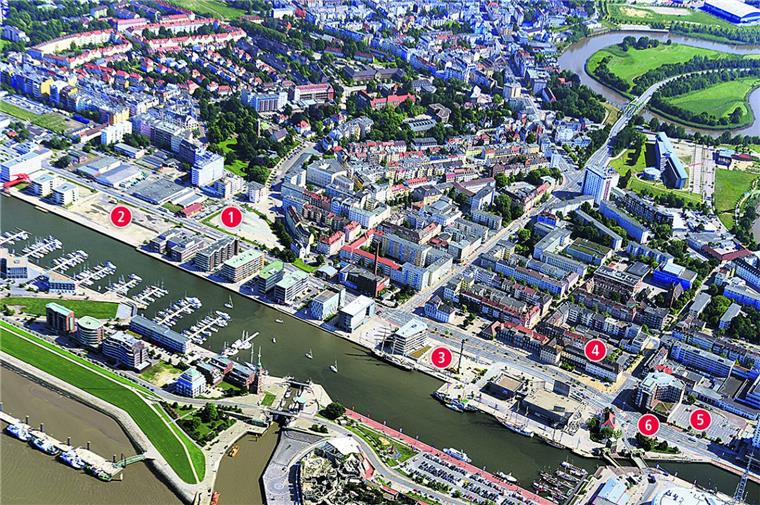 Entwicklungsgebiet Neuer Hafen: Auf dem Areal der Alten Feuerwache (1) möchten private Investoren ein Parkhaus mit Hotel und Dienstleistungszentrum errichten. Auf dem Grundstück gegenüber (2) soll im September mit dem Bau eines Wohnkomplexes begonnen werden. Neben dem Klimahaus signalisiert der Bohrturm den Baubeginn für das Hotel „Liberty“ (3). Das marode Finanzamt (4) soll abgerissen und zusammen mit dem Eulenhof-Grundstück (5) städtebaulich neu geordnet werden. Der Rückbau der Columbusstraße (6) liegt politisch auf Eis. 