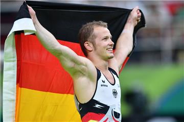 Fabian Hambüchen ist am Ziel seiner Träume: Gold ist im Sack.