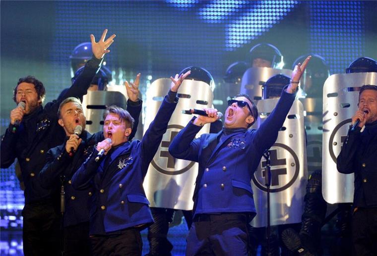 Take-That-Rebell und Familienvater: Robbie Williams wird 50 Feierten gemeinsam große Erfolge: Howard Donald (l-r), Gary Barlow, Mark Owen, Robbie Williams und Jason Orange von der britischen Band Take That (Archivbild).
