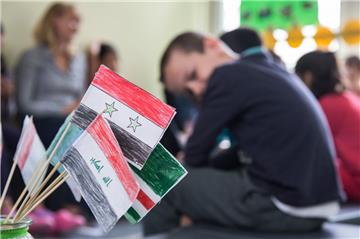 Flüchtlingskinder beim Schulunterricht.