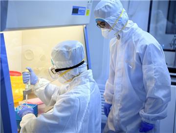 Forscher und Mediziner (hier in China) befinden sich im Kampf gegen das Coronavirus. 
