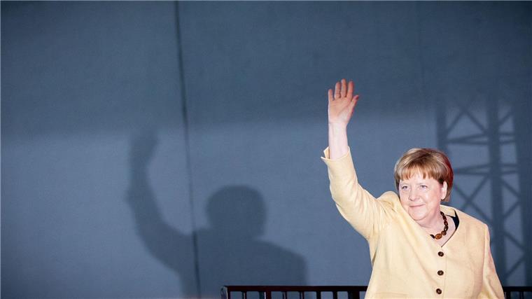 Für ihre Haltung in der Flüchtlingspolitik 2015 erhält Merkel auf dem Kirchentag viel Applaus.