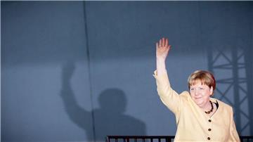Für ihre Haltung in der Flüchtlingspolitik 2015 erhält Merkel auf dem Kirchentag viel Applaus.