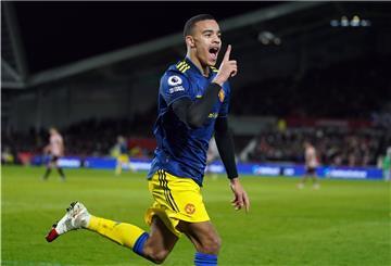 Fußball: Premier League, England, FC Brentford - Manchester United, 17. Spieltag, Brentford Community Stadium: Manchester Uniteds Mason Greenwood feiert das 0:2. 