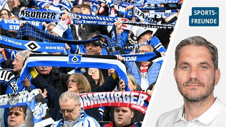 Hamburg-Fans schwenken ihre Fanschals.