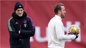 Harry Kane (r) arbeitet bald wieder mit Thomas Tuchel (l) zusammen.