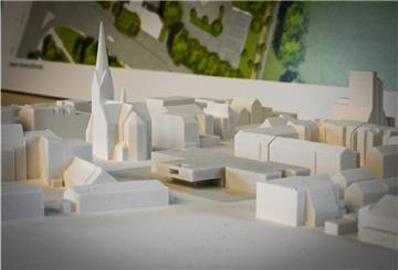 Hinter der Pauluskirche soll die Neue Grundschule Lehe (Baukörper in der Mitte mit Flachdach) entstehen. Der bisherige Stadtteilsportplatz zieht auf das Phillipsfield um.