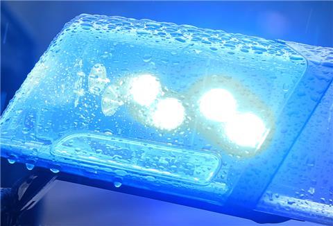 Streifenwagen mit Blaulicht