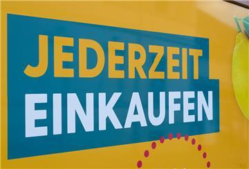 Plakat eines Tante Enso-Ladens