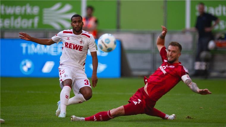 Düsseldorf verhindert im Derby spät die erste Saisonpleite Linton Maina (l) sorgte für das 2:1.