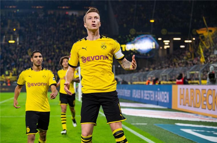 Marco Reus (rechts) jubelt: Er hat das 1:0 für Dortmund geschossen. sein Tor zum 1:0.