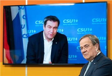 Markus Söder (CSU/links) und Armin Laschet (CDU) sind beide bereit, als Kanzlerkandidat der Union anzutreten.