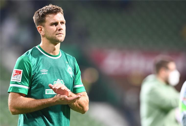 Niclas Füllkrug in einem grünen Trikot
