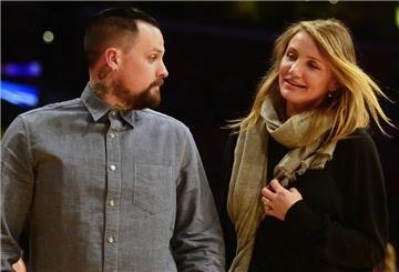 Schnacht er oder nicht? Cameron Diaz  und ihr Ehemann Benji Madden.