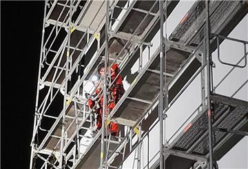 Sicherungsarbeiten auf dem Baugerüst