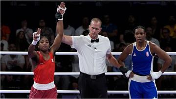 Sie hat es geschaft: Boxerin Ngamba holt die erste Olympia-Medaille für das Flüchtlingsteam.
