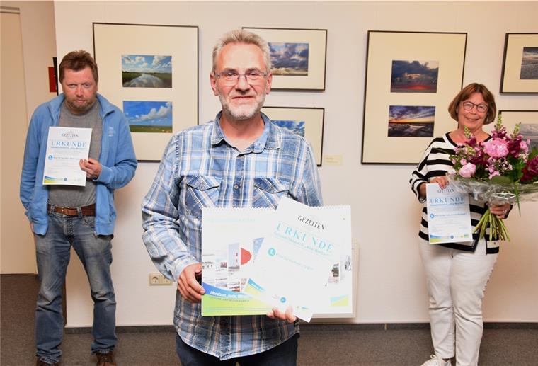 Foto-Wettbewerb in Butjadingen: Jury kürt die schönsten Wetter-Bilder Sie reichten aus Sicht der Jury die schönsten Fotos ein (von links): Bernd Bultmann (zweiter Platz, Tossens), Kai Kinghorst (erster Platz, Berne) und Liane Hodel (dritter Platz, Burhave).