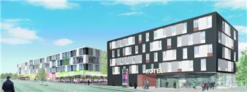 So stellen sich die Investoren ihr Bauprojekt vor: Rechts ein Zwei Sterne-Hotel mit 85 Zimmern, links ein Dienstleistungszentrum mit Lebensmittelmarkt und innen liegendem Parkhaus. Der Entwurf ist nur eine vorläufige Visualisierung. Über die tatsächliche Gestalt soll ein Architektenwettbewerb entscheiden.  Entwurf Salzmann
