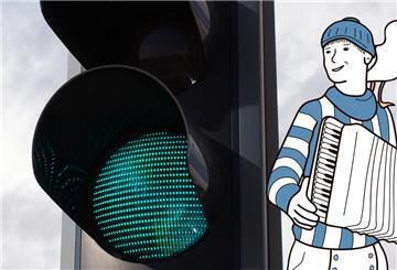 Eine Ampel und Hein Mück Symbol daneben.