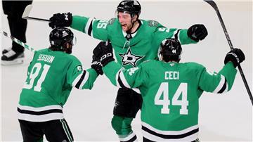 Thomas Harley (M) und die Dallas Stars bejubeln den Siegtreffer in der Verlängerung.