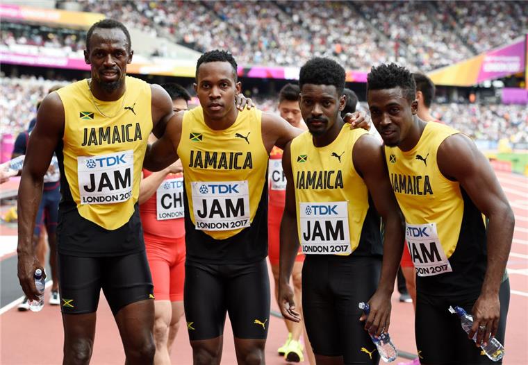 Usain Bolt (links) ist auf dem Weg zum erhofften zwölften WM-Gold mit Jamaikas Sprintstaffel ins Finale gerannt.