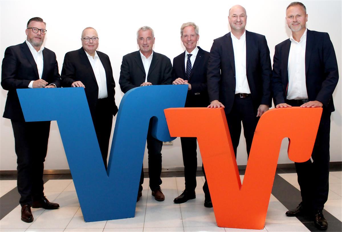 Vorstände und Aufsichtsräte beider Volksbanken