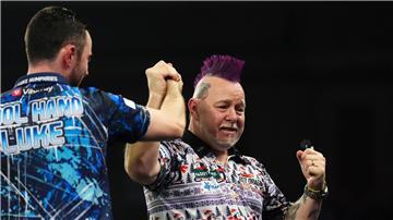Weint nach der riesigen Überraschung: Peter Wright.