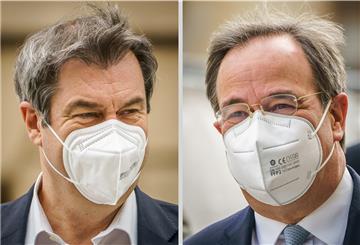 Markus Söder (CSU, l), Ministerpräsident von Bayern und CSU-Vorsitzender, und Armin Laschet, CDU-Bundesvorsitzender und Ministerpräsident von Nordrhein-Westfalen, sind auf dem Weg zur Sitzung der CDU/CSU Fraktion im Bundestag